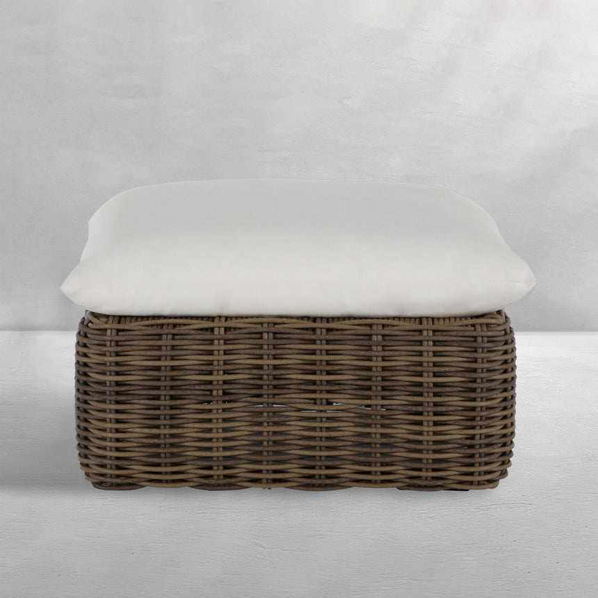 QS Montecito Resin Wicker Ottoman, Raffia with Linen Snow Cushions